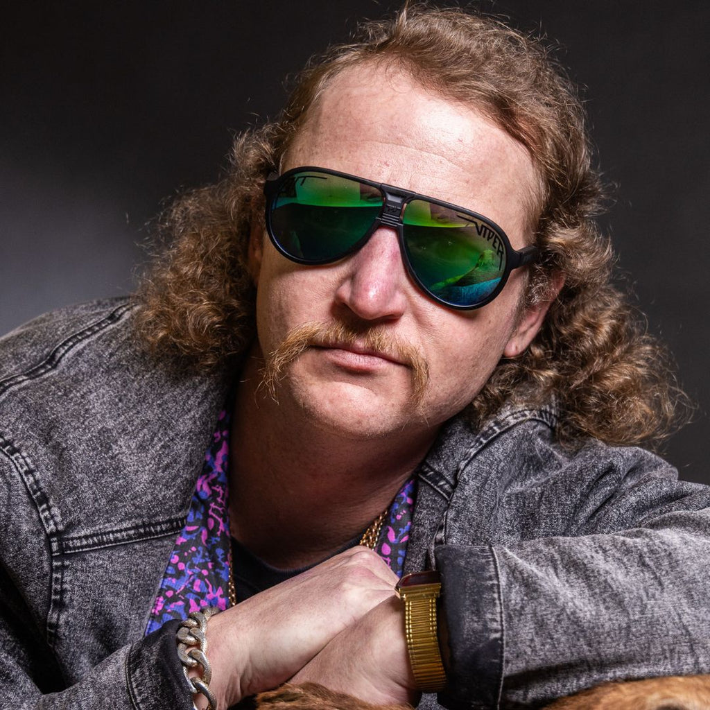 Person wearing The Exec Jethawk with polarized Blue-Green lens