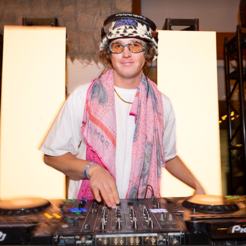 Person wearing The Herbivore Slammer with Photochromic Range lens