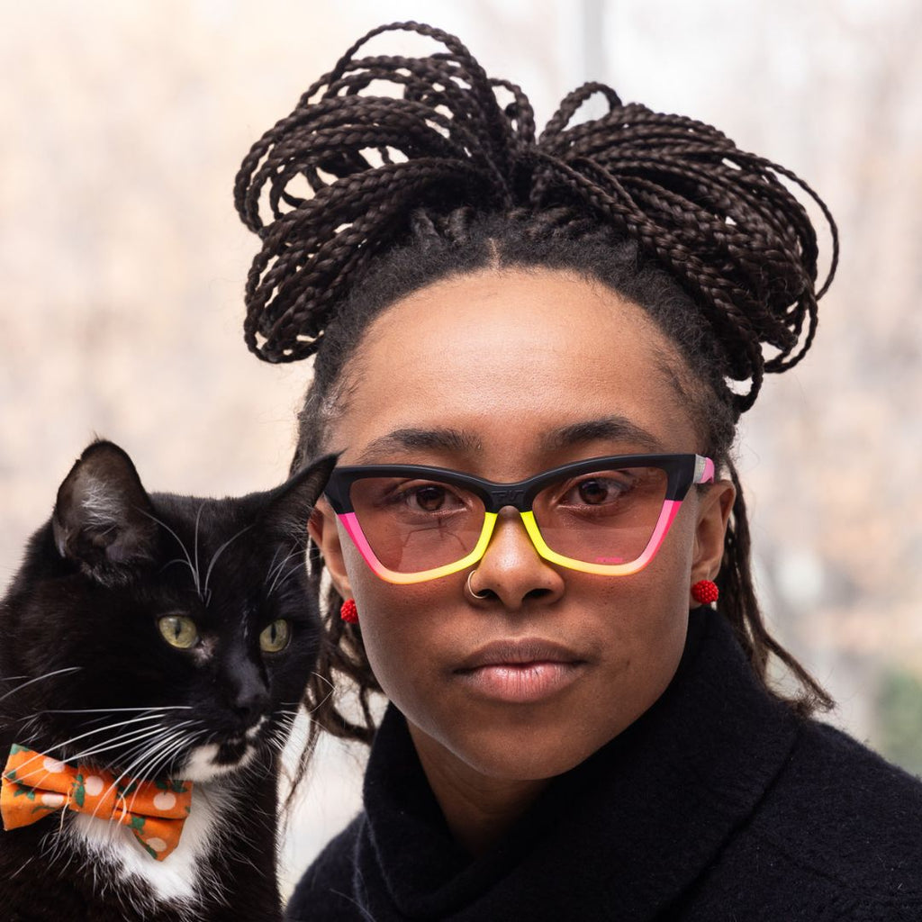 Women wears The Italo Clawdia with a photochromic rose lens from Pit Viper