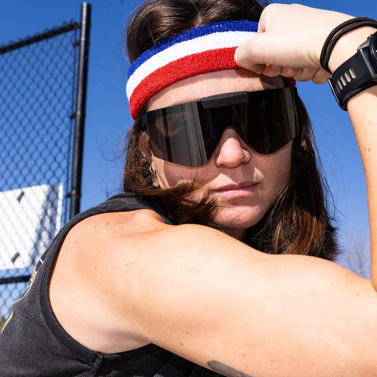 Angled view of The Blacking Out Flip-Offs 2.0 with smoke / regular lens on white background