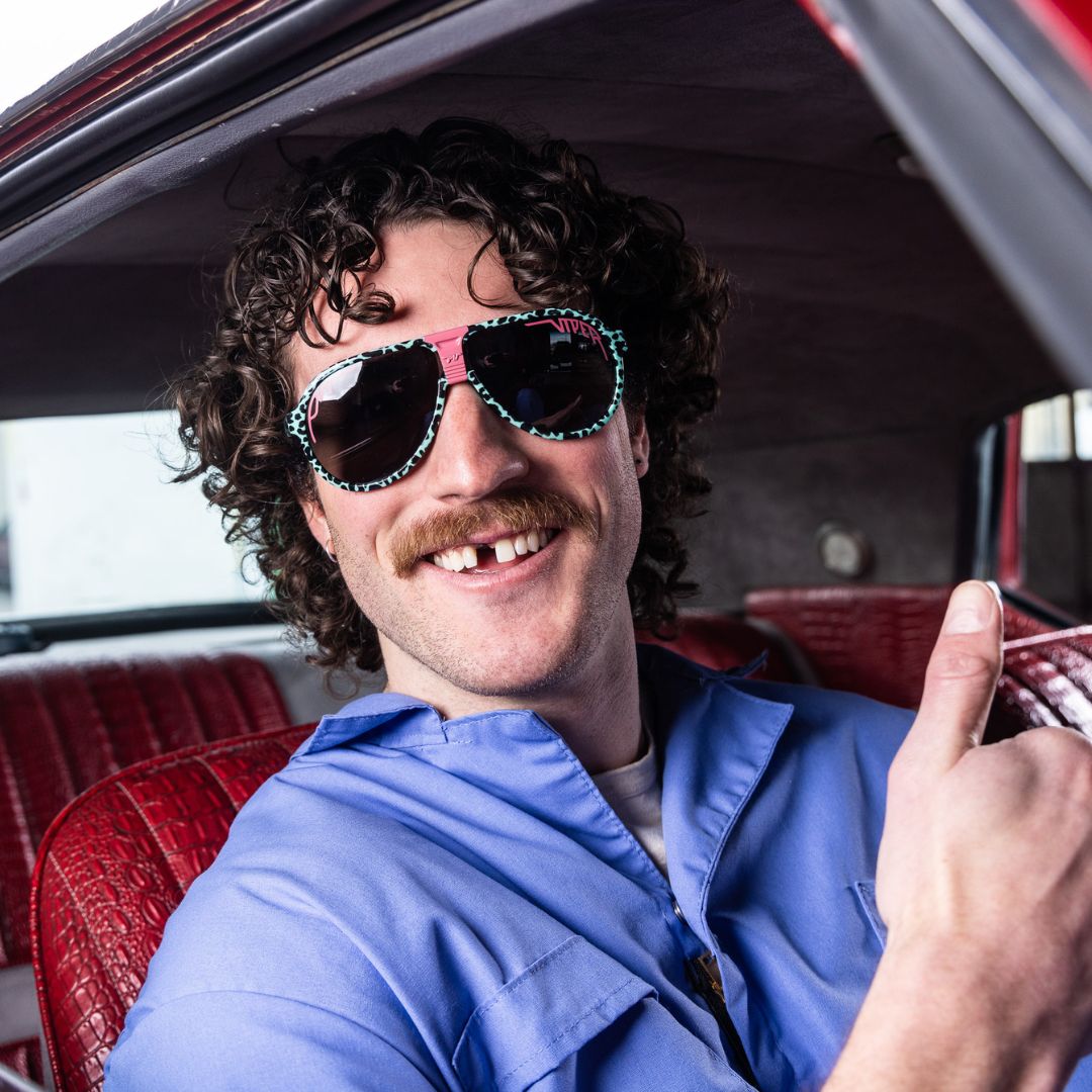 Man gives a thumbs up while wearing The Marissa’s Nails Jethawk with a Polarized Smoke lens from Pit Viper Sunglasses