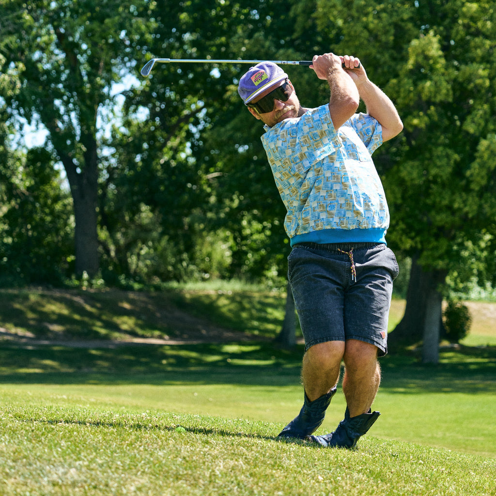 Person wearing The Blacking Out Original 2.0 with BALL-ISTIC™ Smoke lens in wide fit