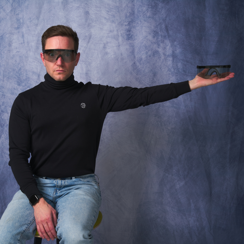 Angled view of The Blacking Out Original 2.0 with photochromic smoke lens on white background