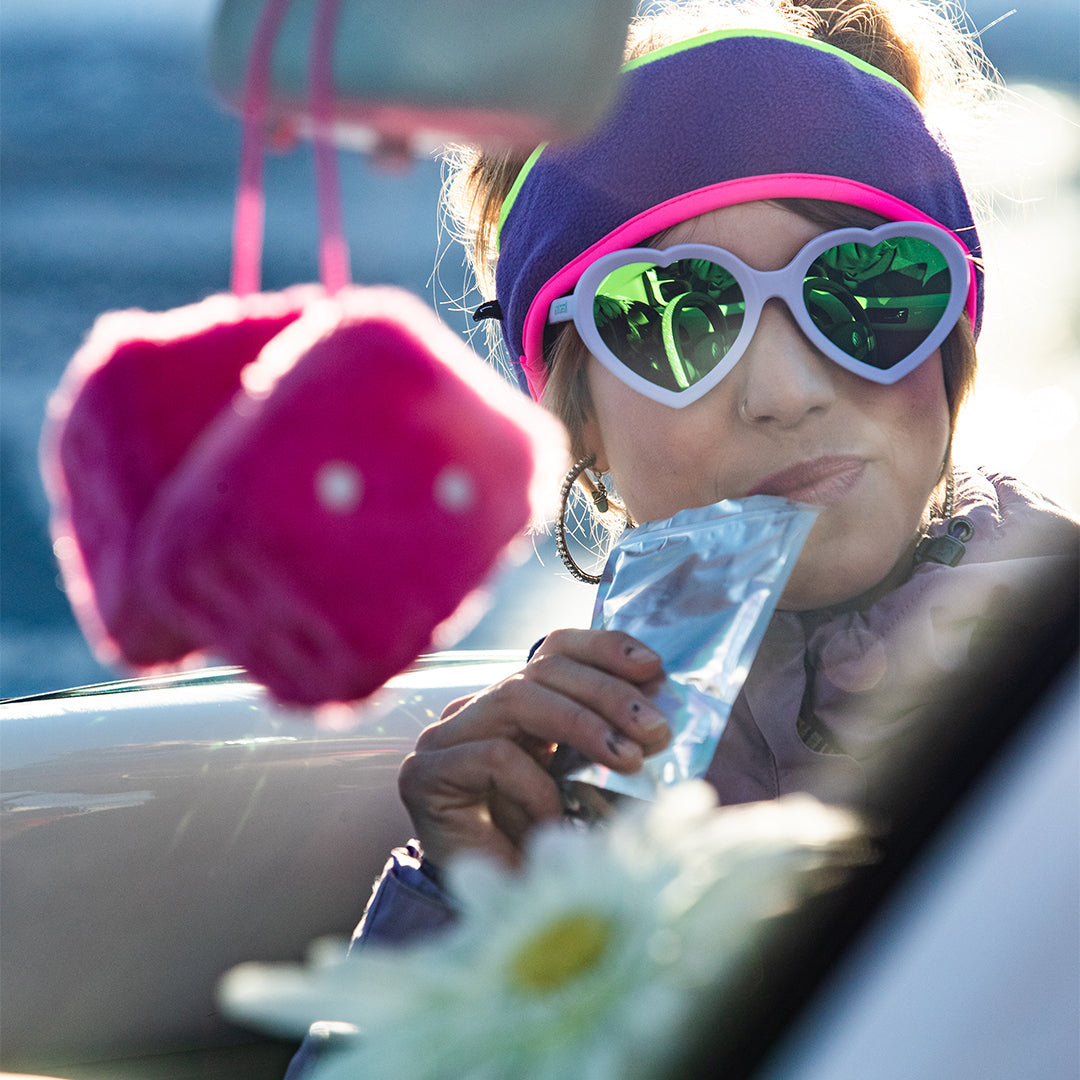 Woman drinking in The Moontower Admirer from Pit Viper Sunglasses