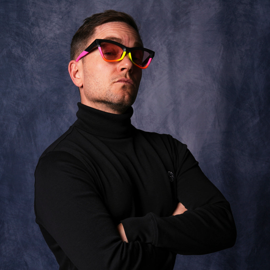 Front view of The Italo Clawdia with Photochromic Rose lens on white background