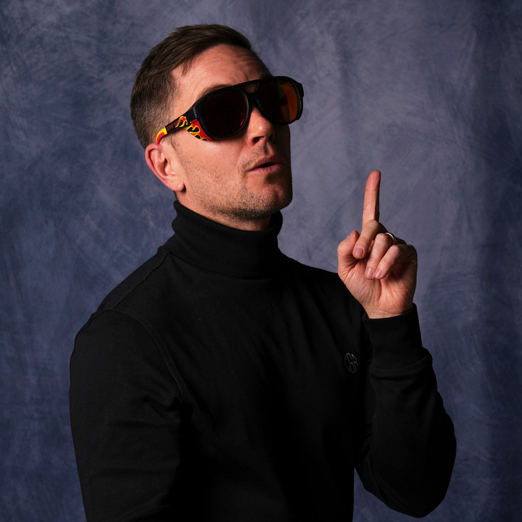 A very important businessman wearing dual lens sunglasses