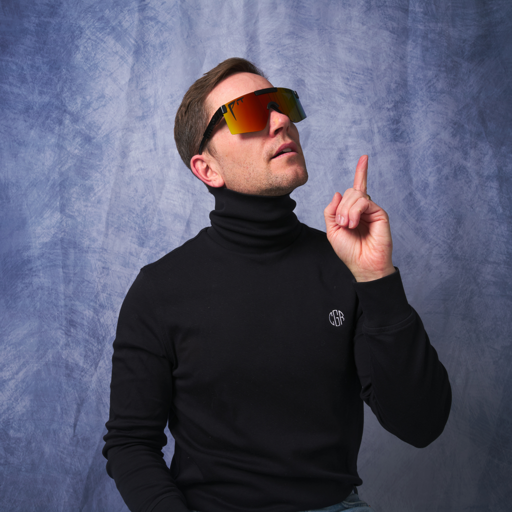 Person wearing The Exec Original 2.0 with HDPV Polarized Rainbow lens