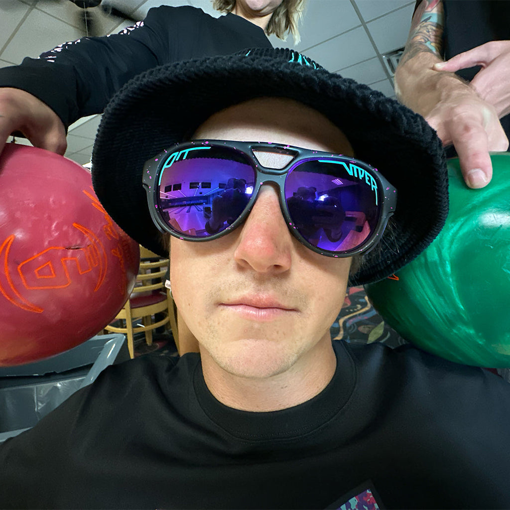 Studio view of The Ignition Exciters with polarized z87+ purple lens