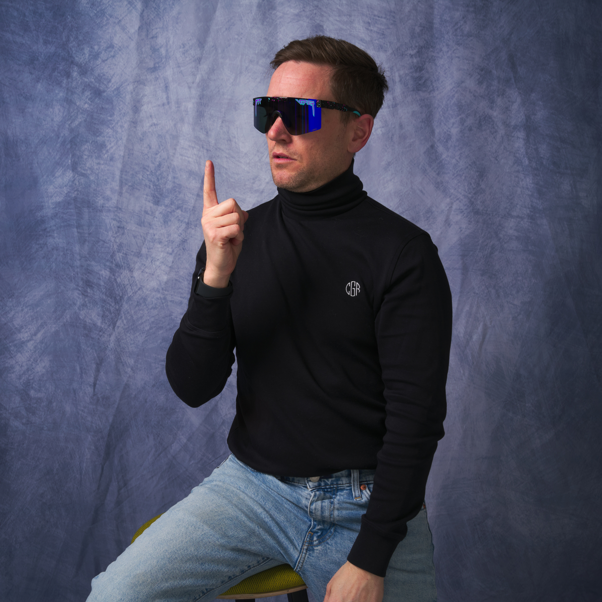 Person wearing The Midnight Original 2.0 with HDPV Polarized Purple lens