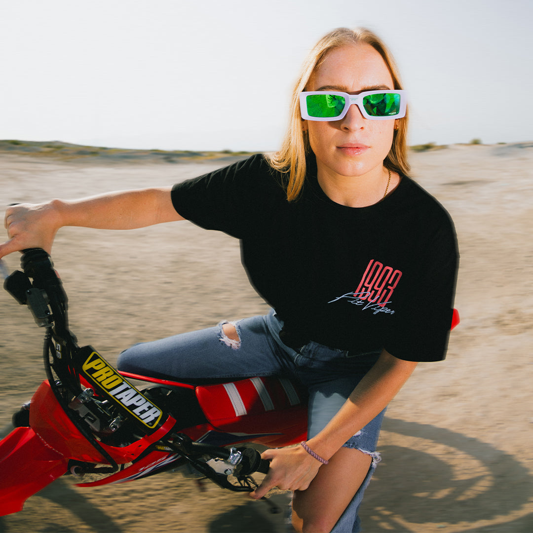 Person wearing The Moontower Low Bones sunglasses