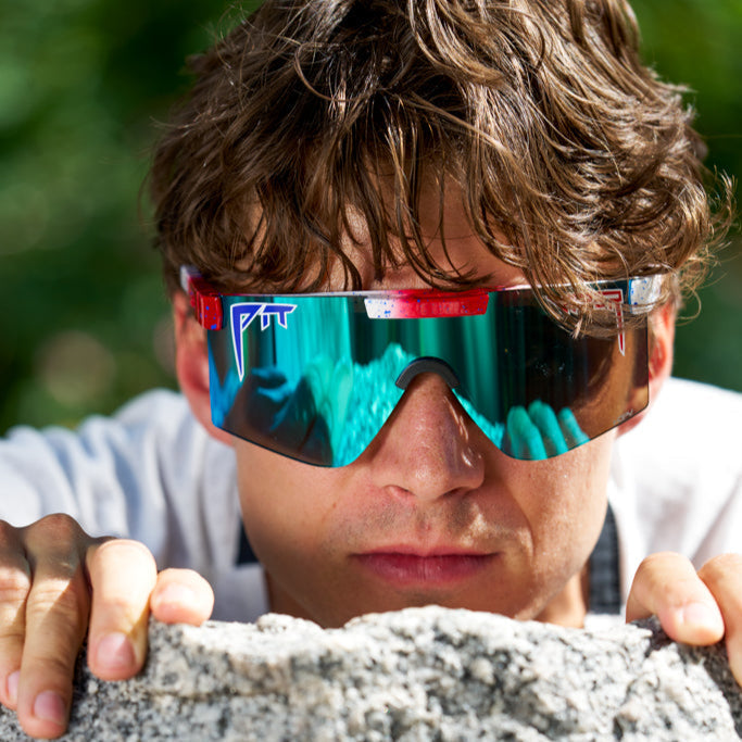 Person wearing The Firecracker Original 2.0 with HDPV Polarized Blue lens in wide fit