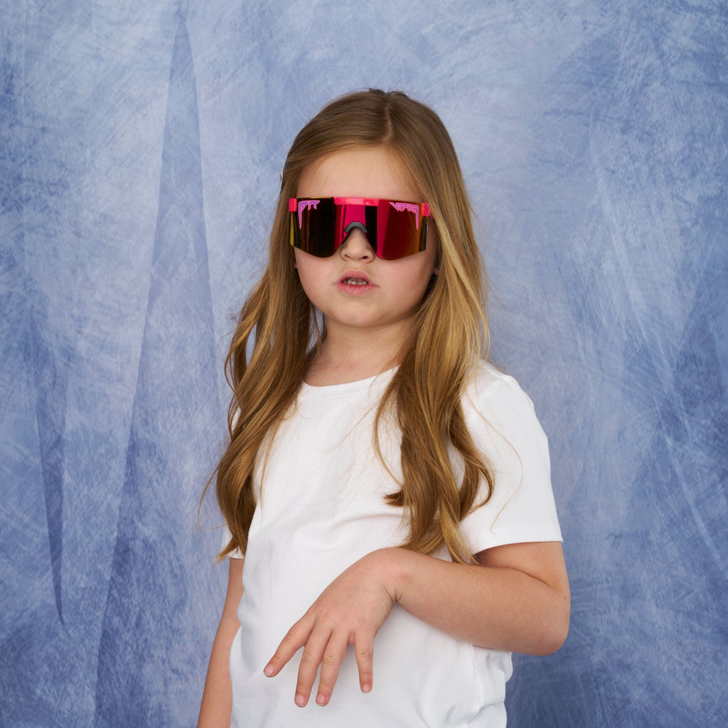 Person wearing The Radical Junior with Rainbow lens