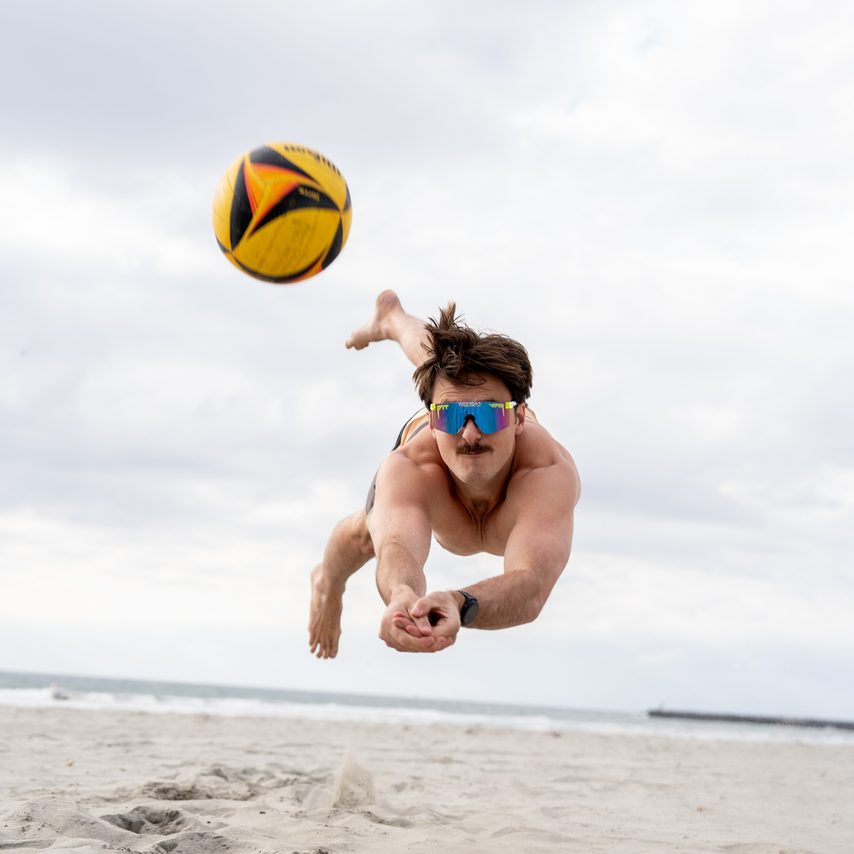 Person wearing The Rec Beach Original 2.0 with HDPV Polarized Blue-Purple lens