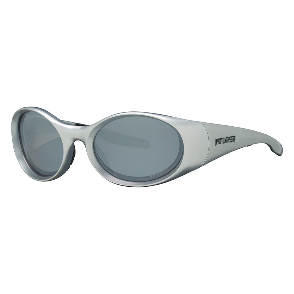 The Spine Tingler Slammer from Pit Viper, 1999 retro oval sunglasses with a silver frame and a silver lens