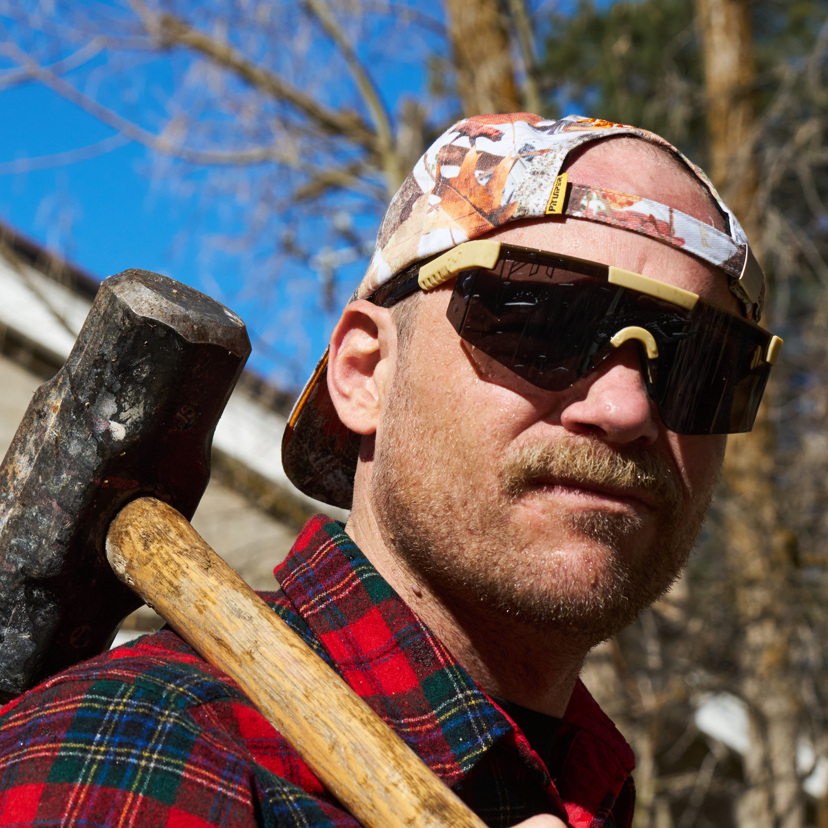 Person wearing The Sandstorm Original 2.0 with BALL-ISTIC™ Smoke lens in wide fit